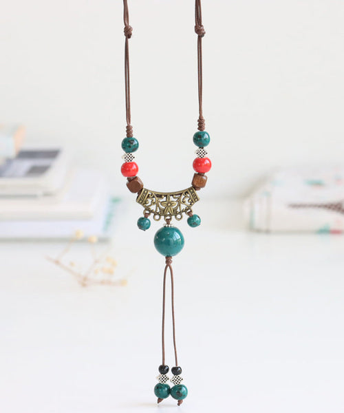 Handmade Bronze Coppery Woven Ceramics Hollow Out Tassel Pendant Necklace TX006